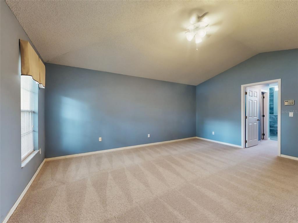 116 Wood Ridge Trail Sanford, FL 32771 - Photo 25 of 49 a view of an empty room with a window