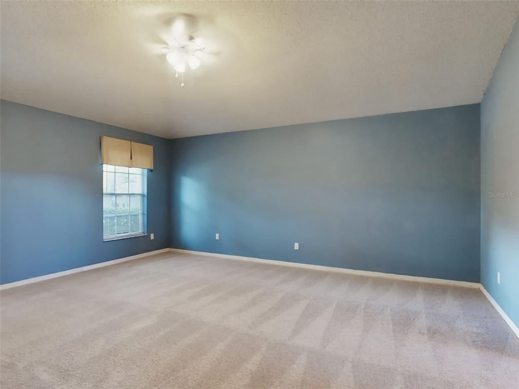 116 Wood Ridge Trail Sanford, FL 32771 - Photo 27 of 49 a view of an empty room with a window