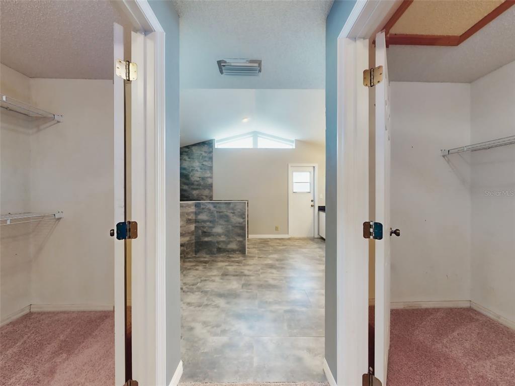 116 Wood Ridge Trail Sanford, FL 32771 - Photo 28 of 49 a bathroom with a glass shower door