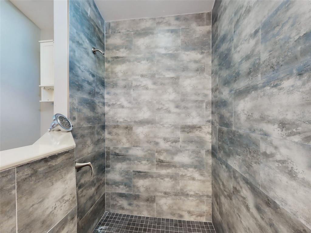 116 Wood Ridge Trail Sanford, FL 32771 - Photo 34 of 49 a bathroom with a shower