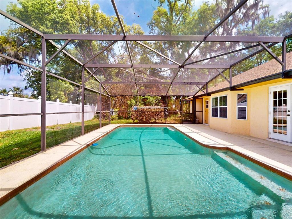 116 Wood Ridge Trail Sanford, FL 32771 - Photo 46 of 49 a view of a backyard with furniture and a backyard