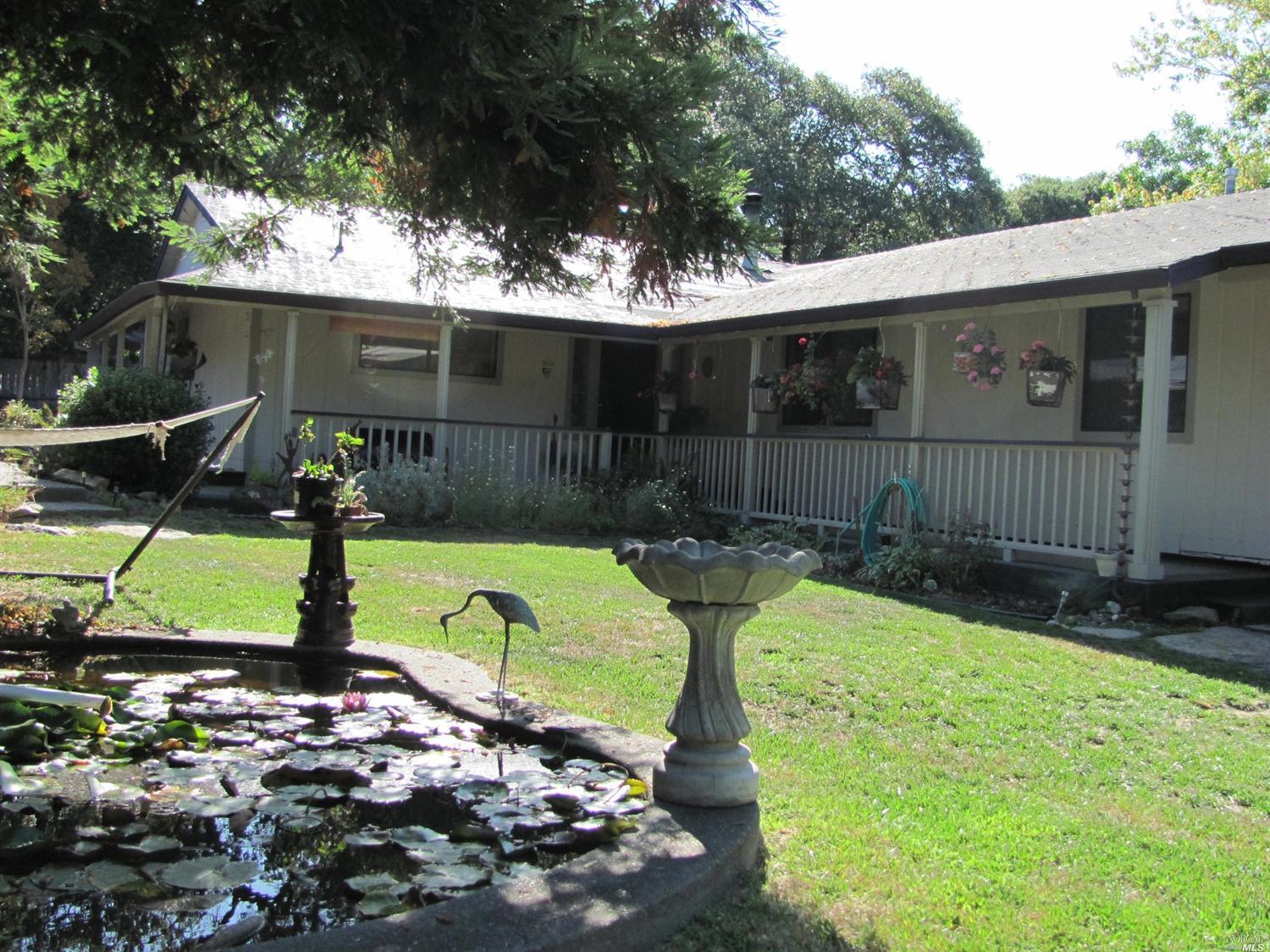 709 First Street Sebastopol, CA 95472 - Photo 1 of 1 a view of a backyard with plants and a patio