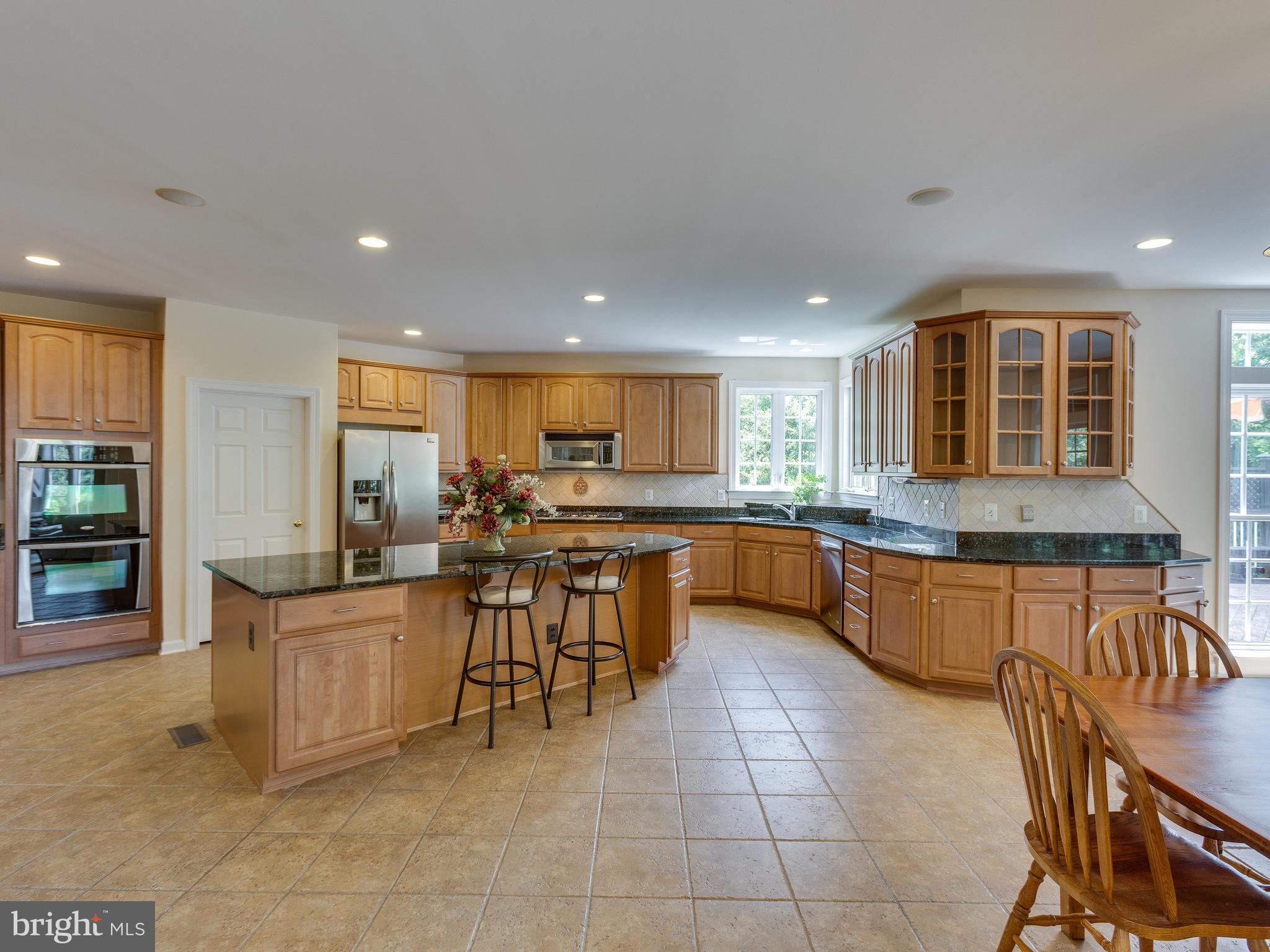 42294 Iron Bit Place Chantilly, VA 20152 - Photo 16 of 55 Double ovens and gas stove.