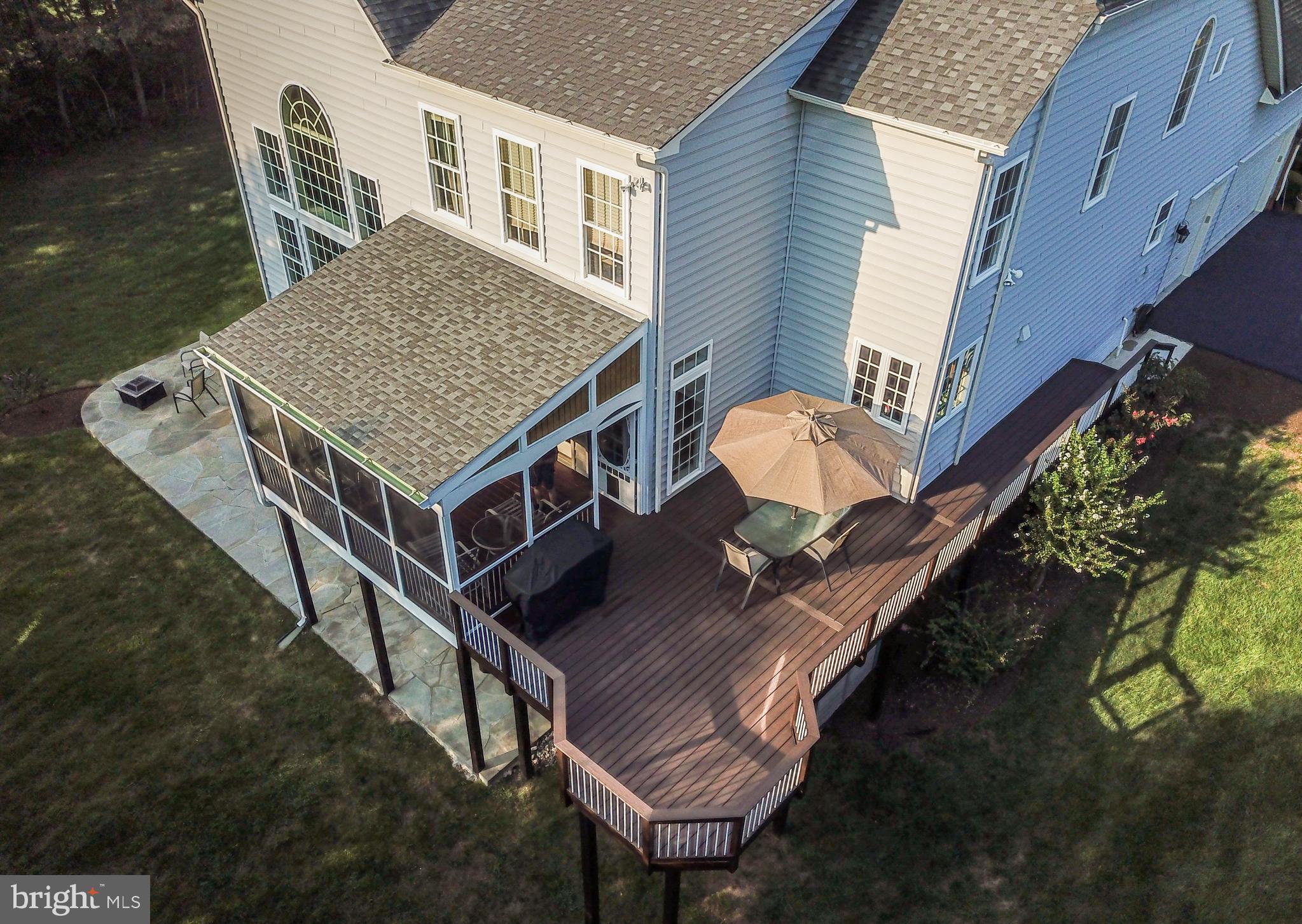 42294 Iron Bit Place Chantilly, VA 20152 - Photo 50 of 55 The deck wraps around the side of the house.