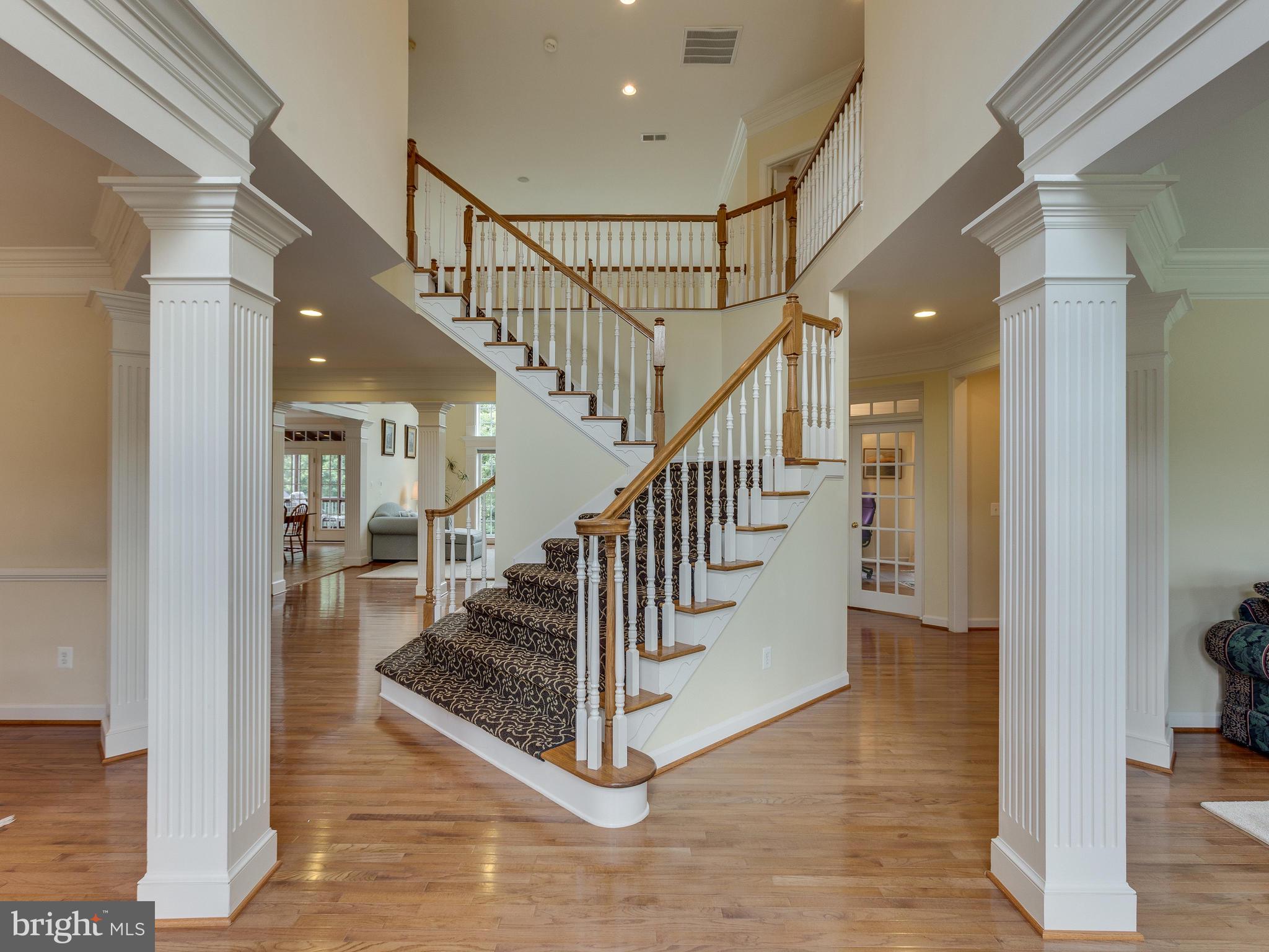 42294 Iron Bit Place Chantilly, VA 20152 - Photo 7 of 55 Two story entrance way greets you as you enter.