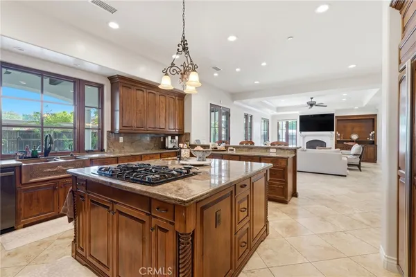 a view of a livingroom with workspace and a window
