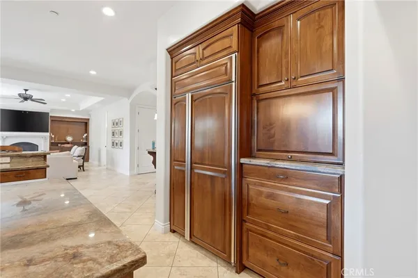 a bed room with a bed and a chair