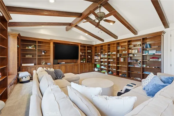 a spacious bathroom with a double vanity sink and a mirror