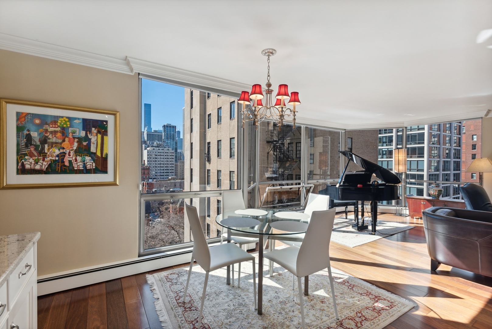 1310 North Ritchie Court, Unit 12BC Chicago, IL 60610 - Photo 15 of 38 a living room with furniture and a chandelier