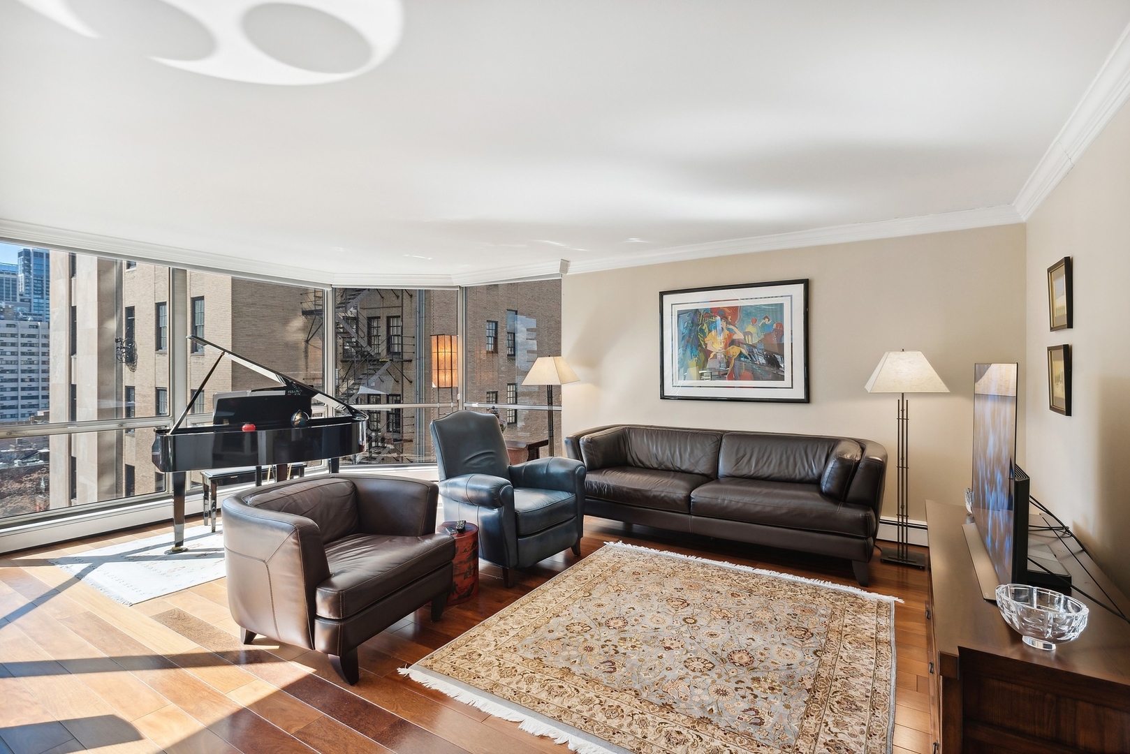 1310 North Ritchie Court, Unit 12BC Chicago, IL 60610 - Photo 17 of 38 a living room with furniture and a rug