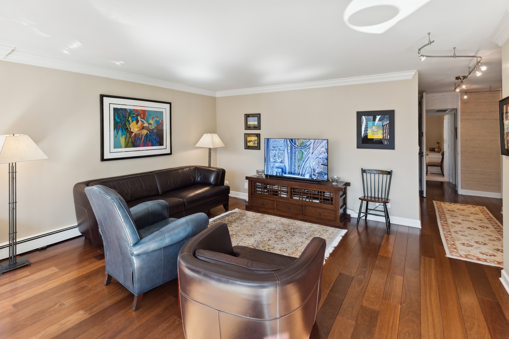 1310 North Ritchie Court, Unit 12BC Chicago, IL 60610 - Photo 20 of 38 a living room with furniture and a wooden floor