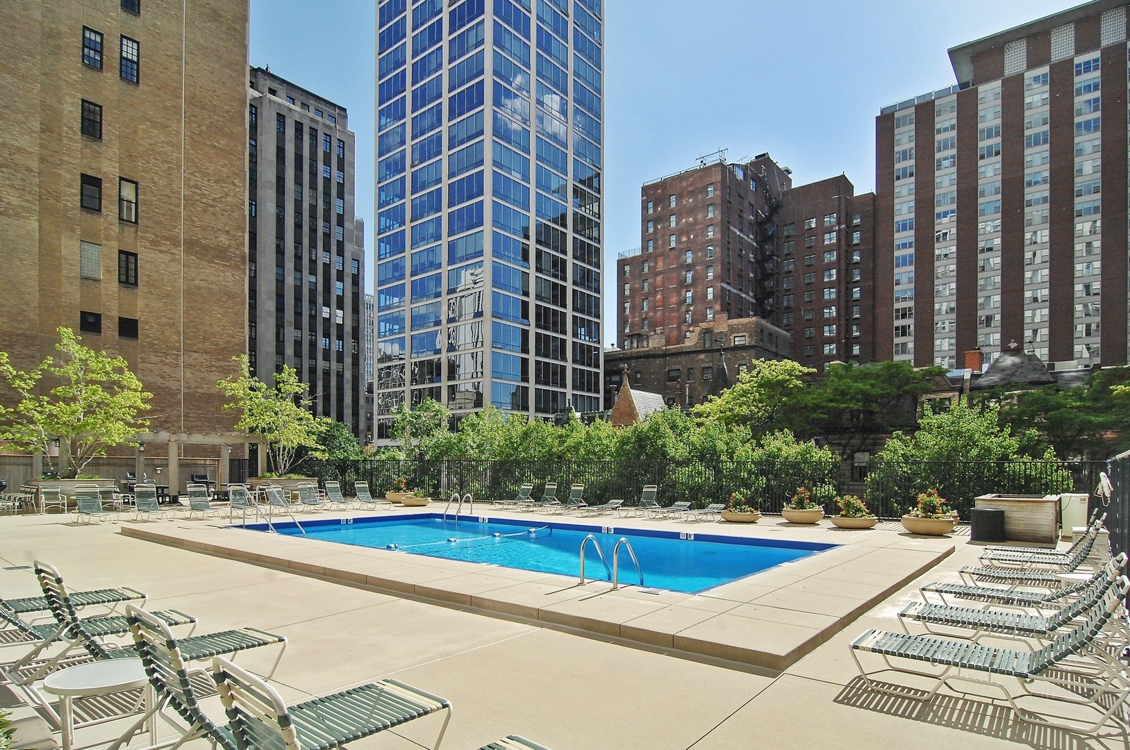 1310 North Ritchie Court, Unit 12BC Chicago, IL 60610 - Photo 33 of 38 a view of a buildings with a outdoor space