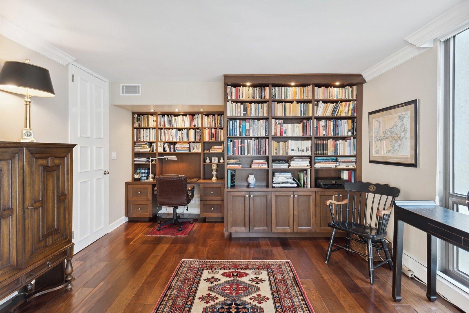 1310 North Ritchie Court, Unit 12BC Chicago, IL 60610 - Photo 7 of 38 a living room with furniture and a rug