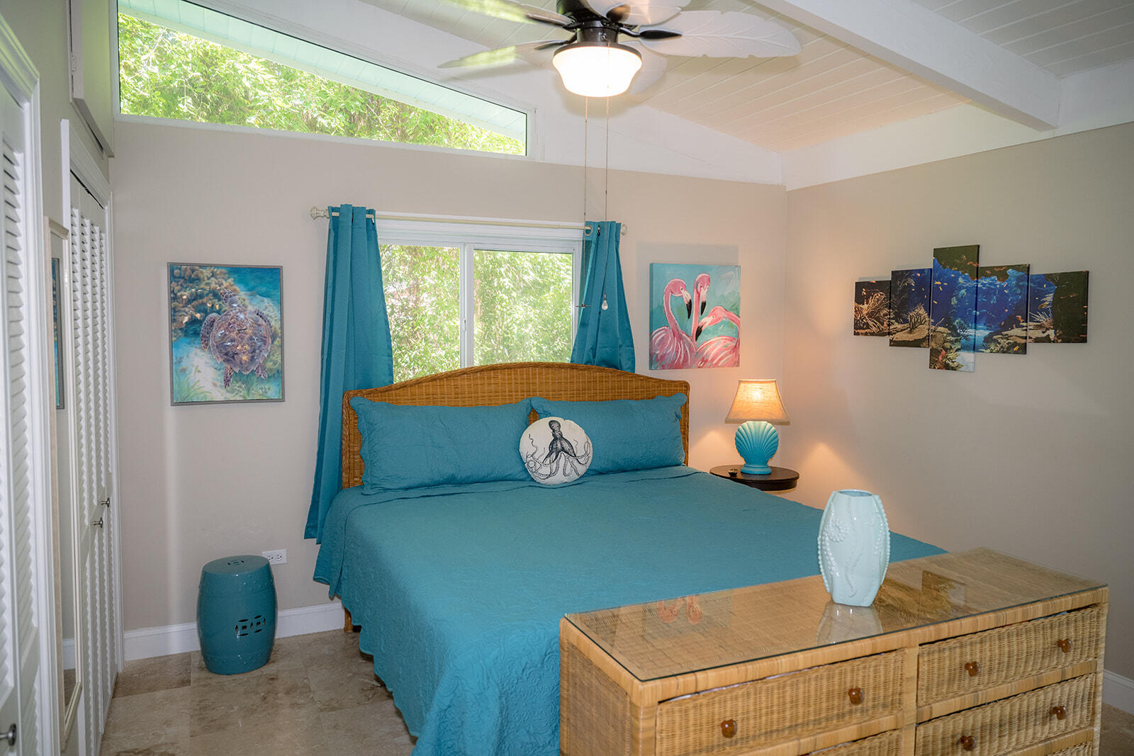 21 Sunset Road Key Largo, FL 33037 - Photo 48 of 121 a bedroom with a bed and a chandelier