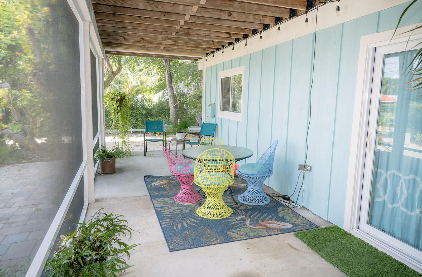 21 Sunset Road Key Largo, FL 33037 - Photo 75 of 121 a view of a patio with chair and table in the patio