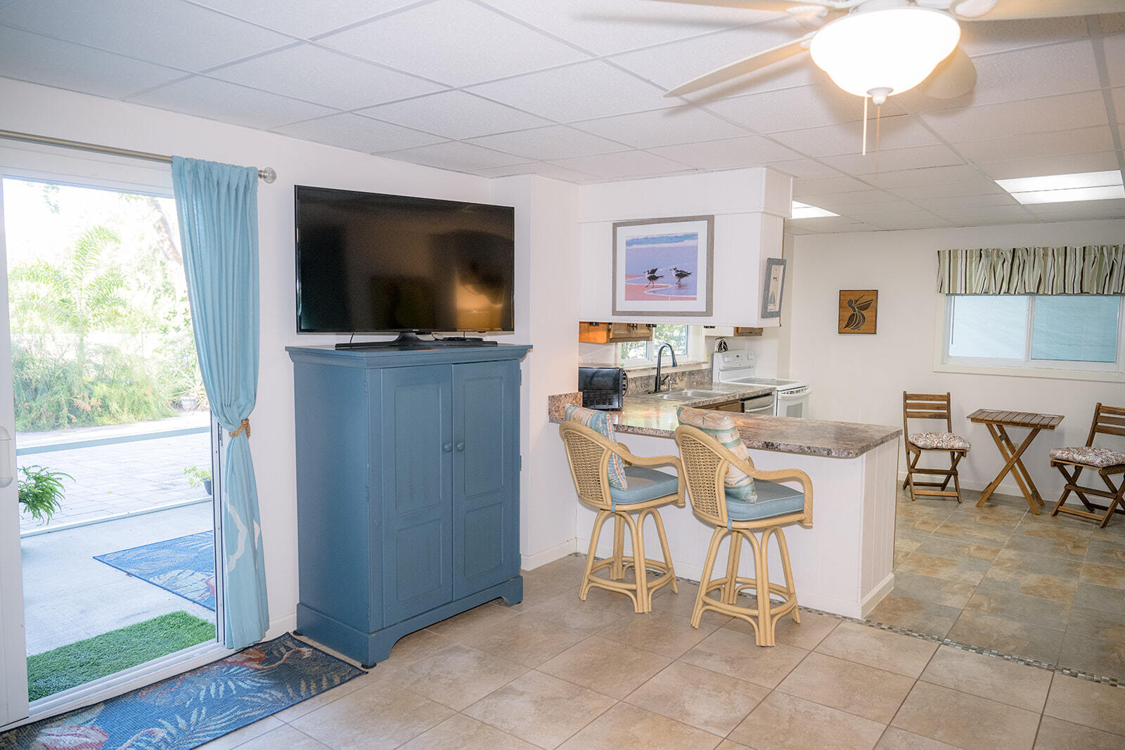 21 Sunset Road Key Largo, FL 33037 - Photo 81 of 121 a view of a dining room with furniture window and outside view
