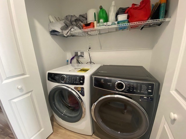 152 West Main Street, Unit A Millbury, MA 01527 - Photo 29 of 33 a utility room with dryer and washer