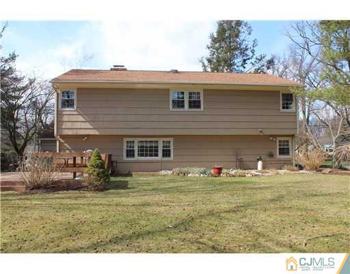 10 Moraine Road Edison, NJ 08820 - Photo 8 of 25 a front view of house with yard