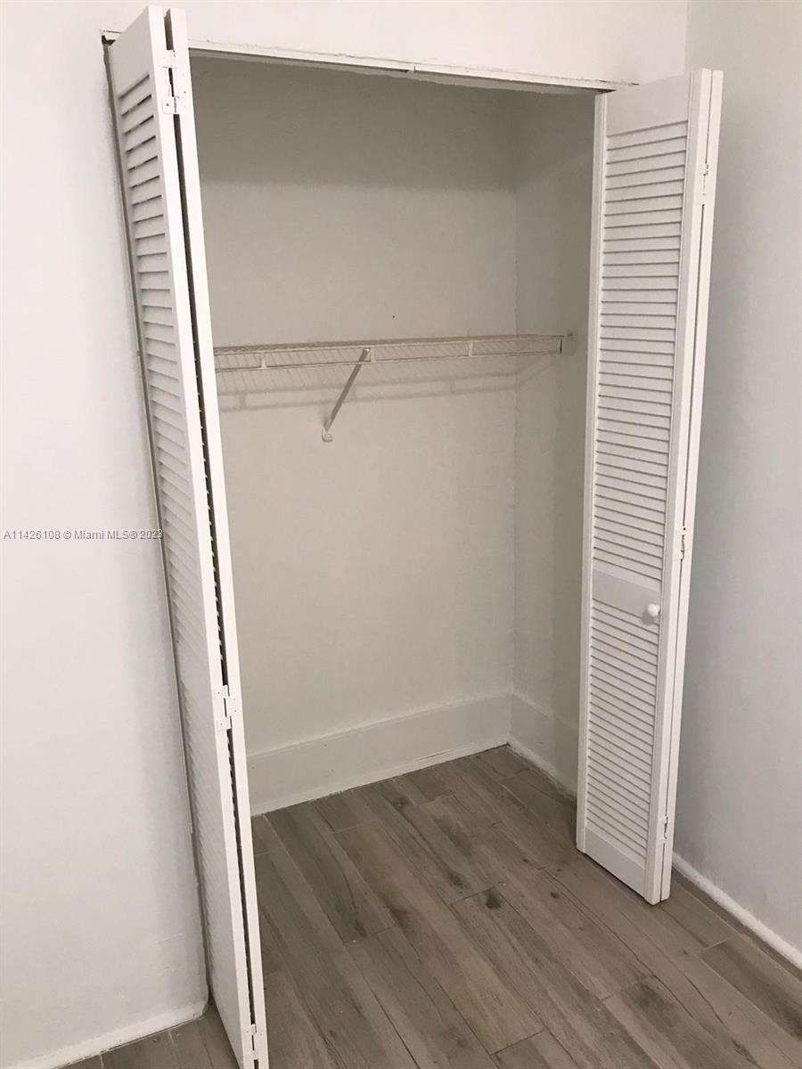 Flamingo-Lummus Miami Beach, FL 33139 - Photo 13 of 13 a view of walk in closet with wooden floor