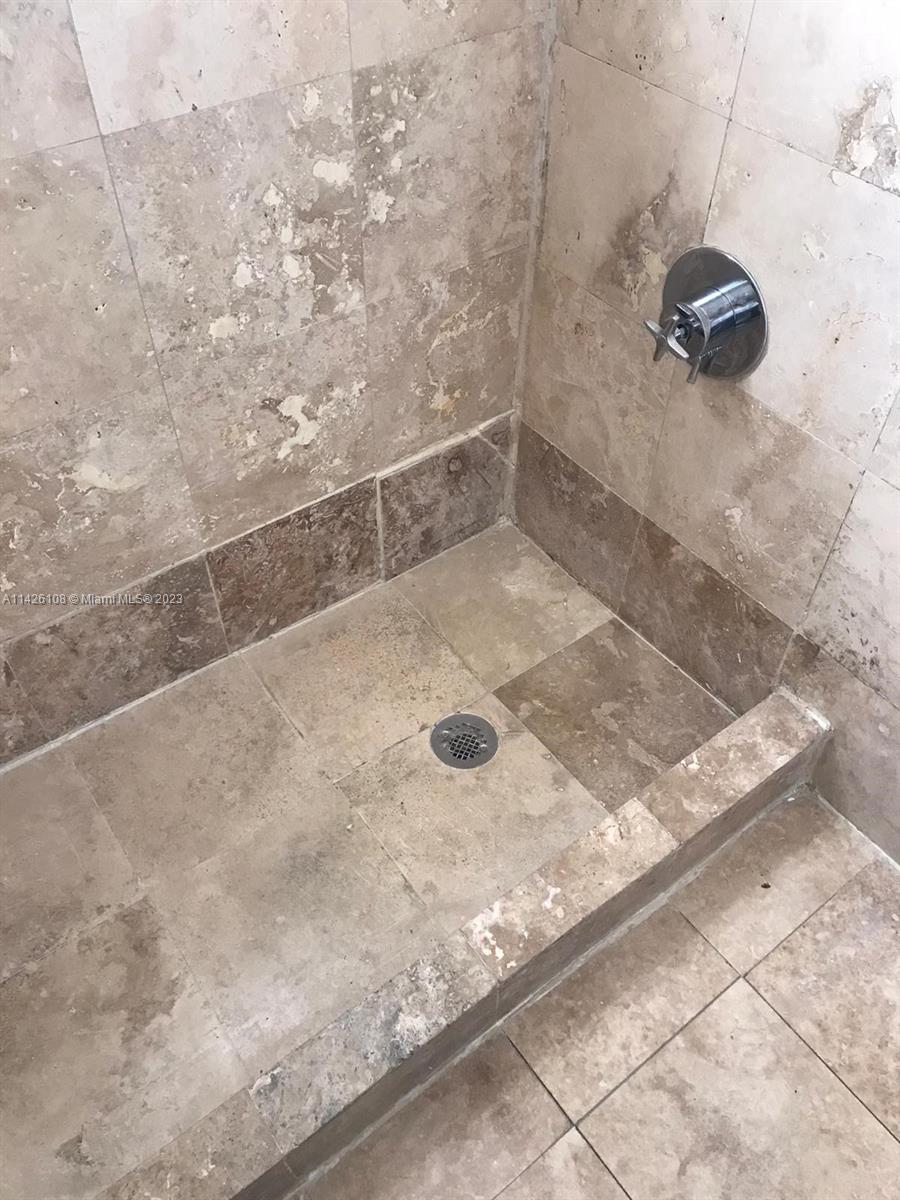 Flamingo-Lummus Miami Beach, FL 33139 - Photo 9 of 13 a bathroom with a shower