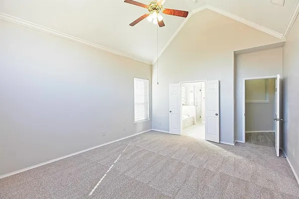 a bathroom with a granite countertop double sink and a mirror