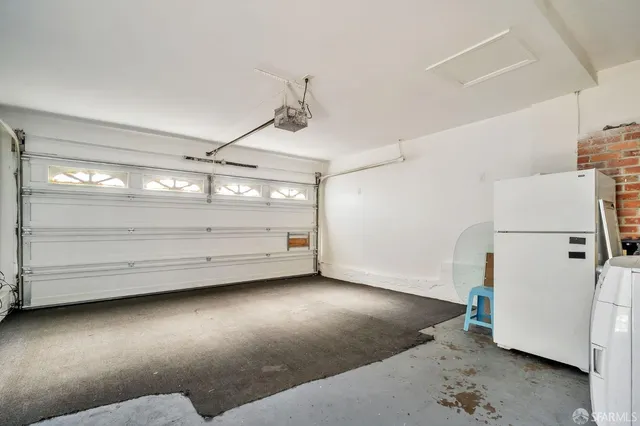 a view of a livingroom with wooden floor