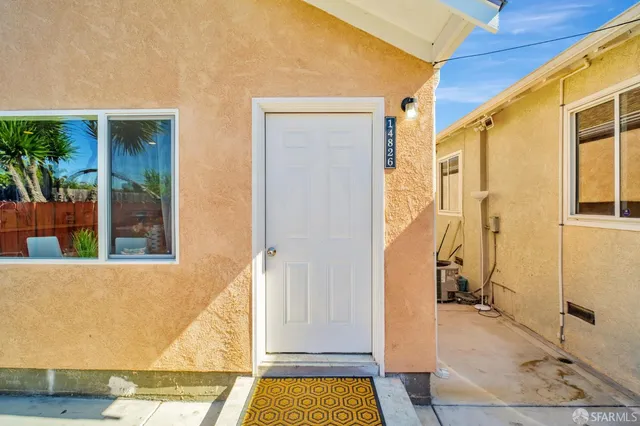 a view of a house with a glass door