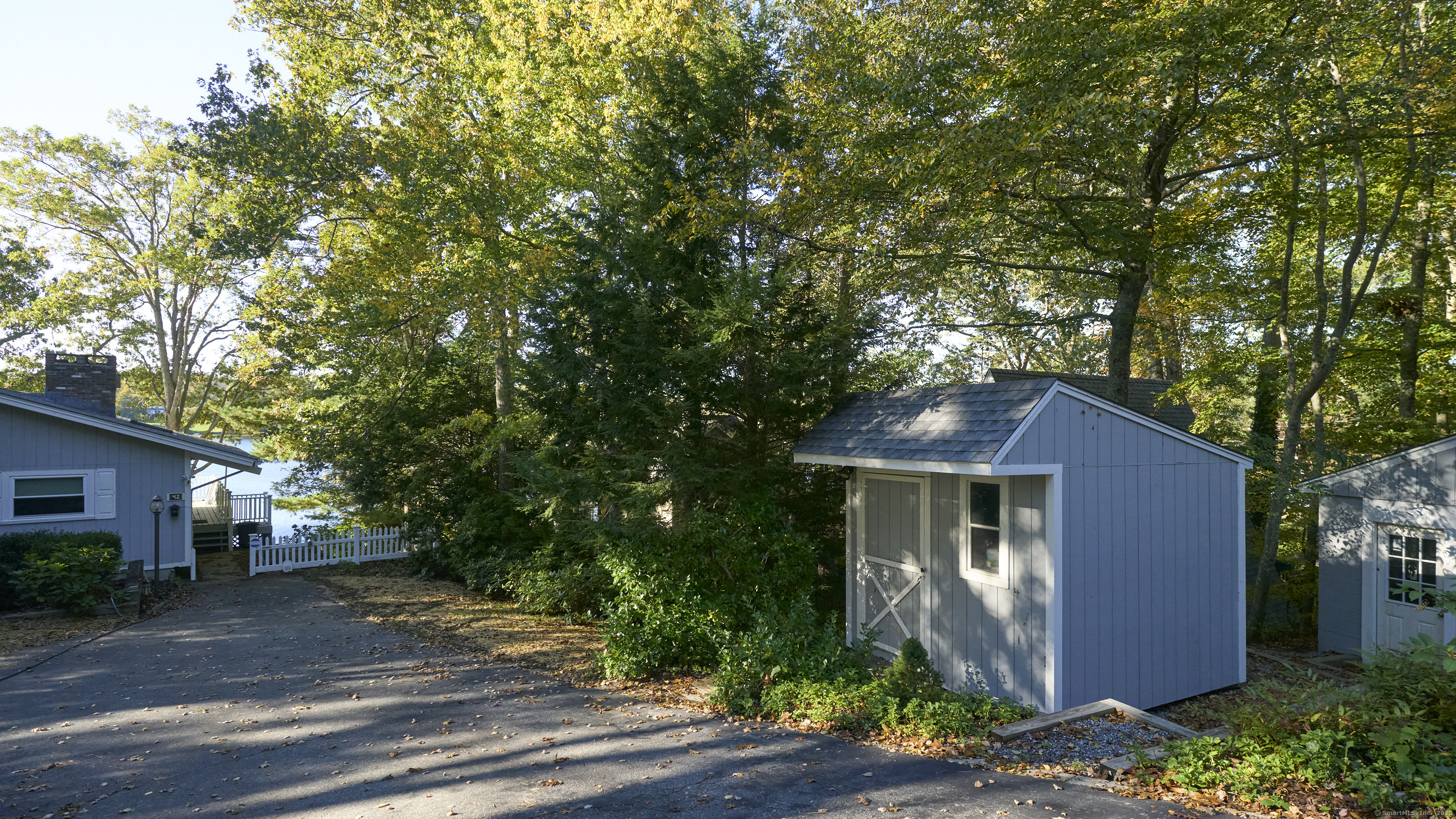 42 Dogwood Road East Haddam, CT 06469 - Photo 11 of 40 a front view of a house with a yard and tree s