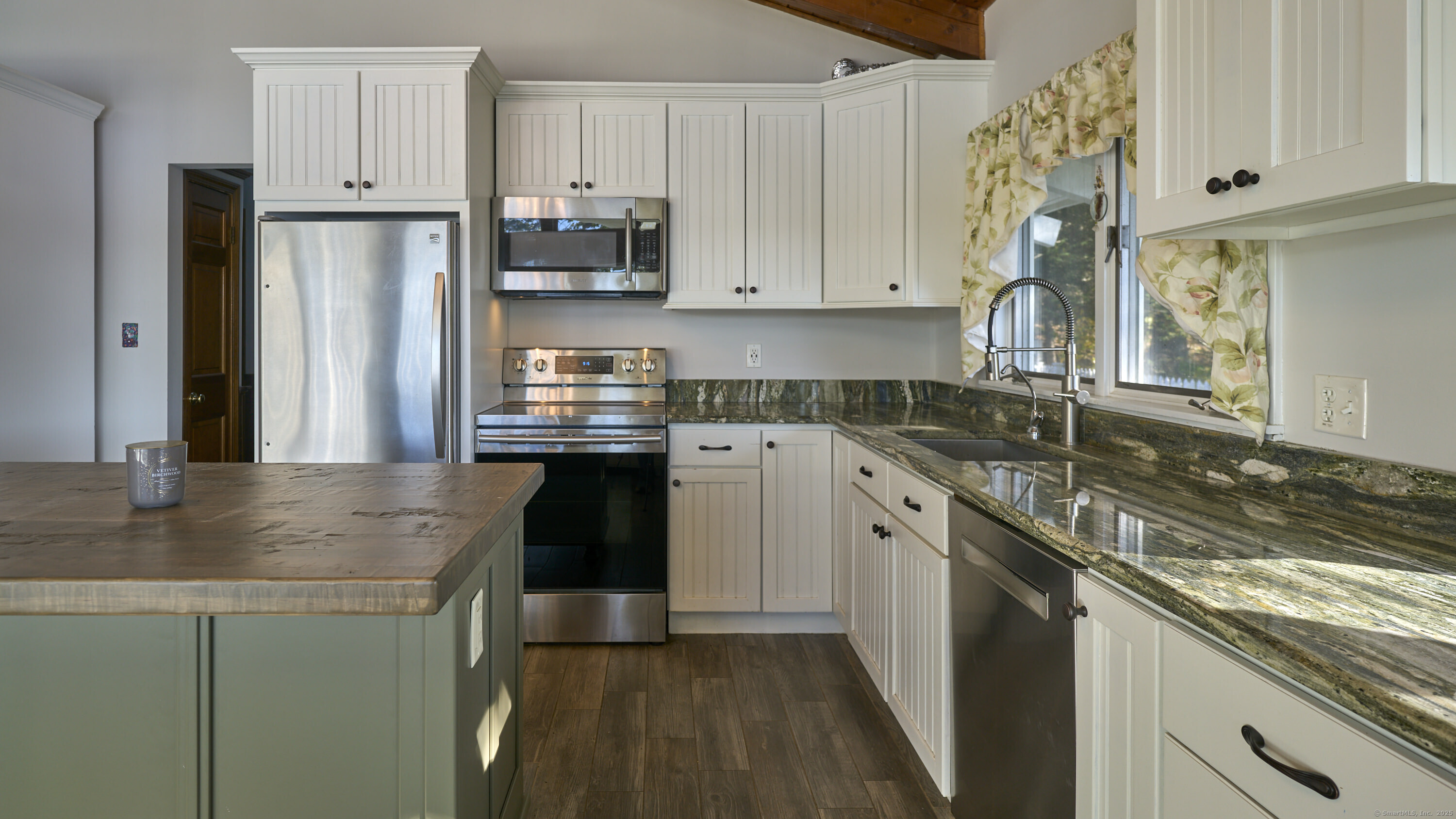 42 Dogwood Road East Haddam, CT 06469 - Photo 20 of 40 a kitchen with stainless steel appliances granite countertop a sink stove and refrigerator