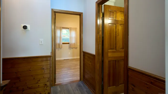 a bathroom with a granite countertop shower and a sink