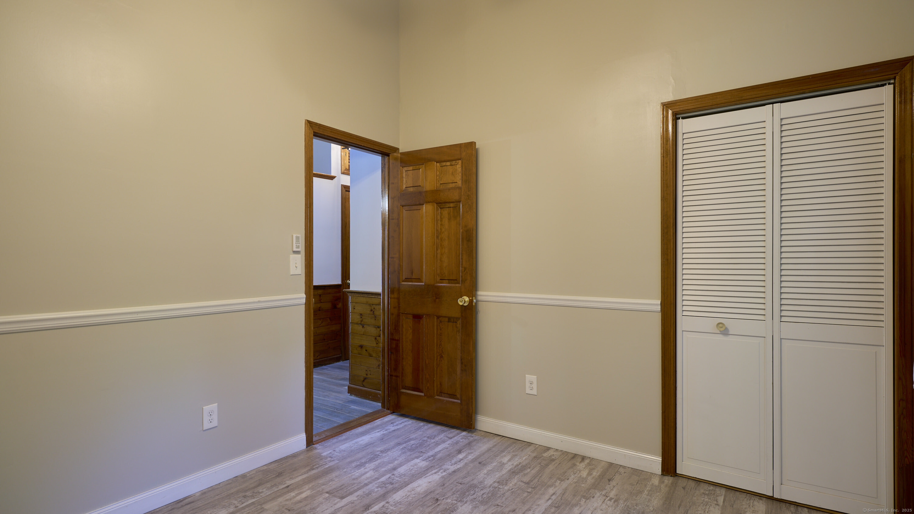 42 Dogwood Road East Haddam, CT 06469 - Photo 29 of 40 a view of an empty room with wooden floor