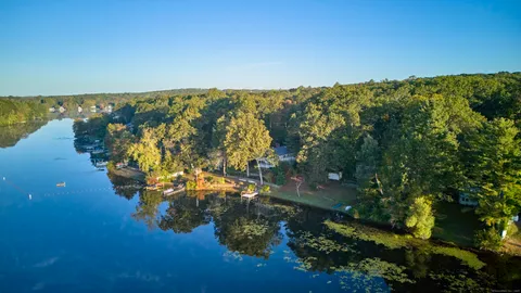 a view of a houses with yard