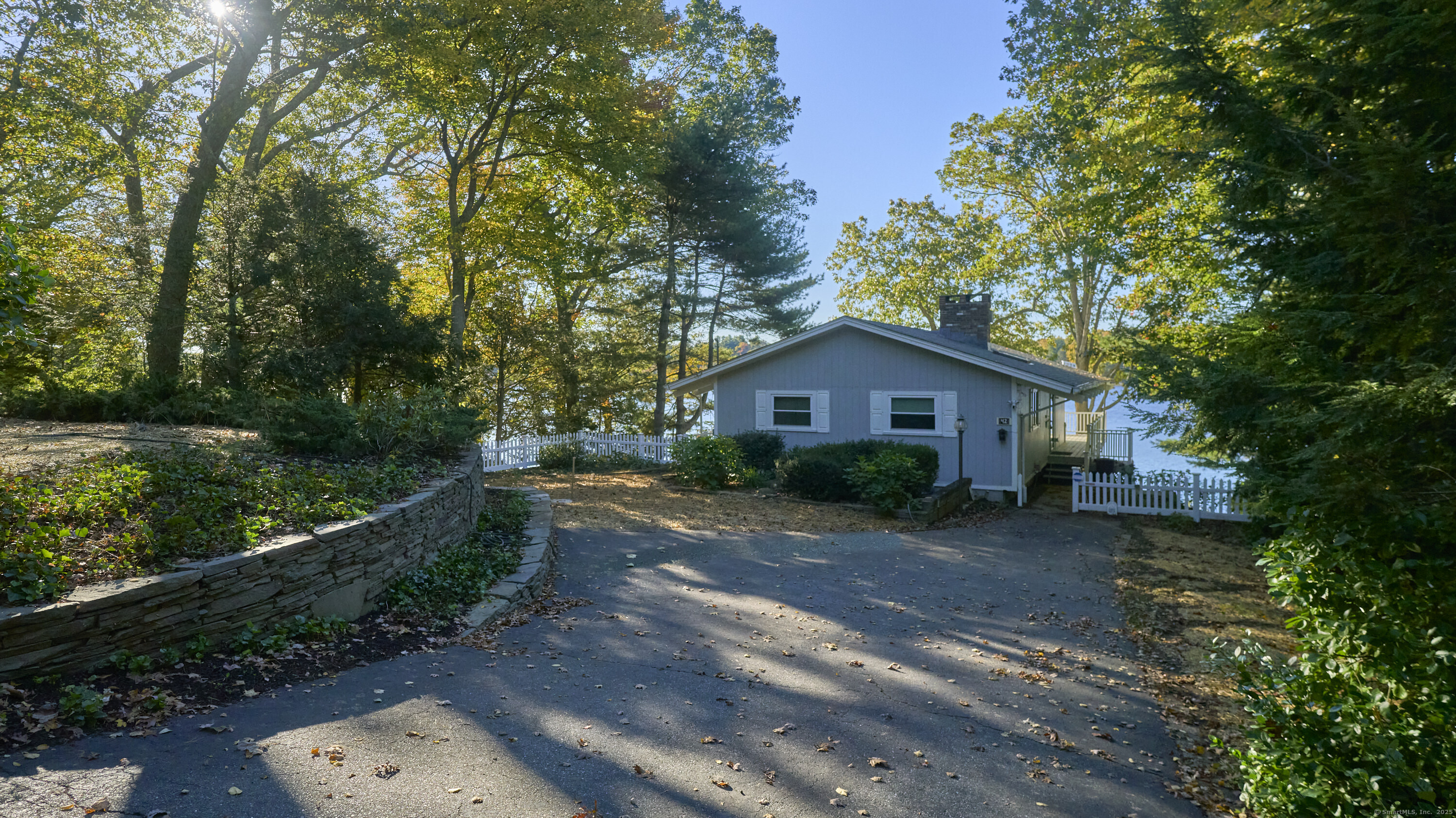 42 Dogwood Road East Haddam, CT 06469 - Photo 10 of 40 a front view of a house with a yard and pathway