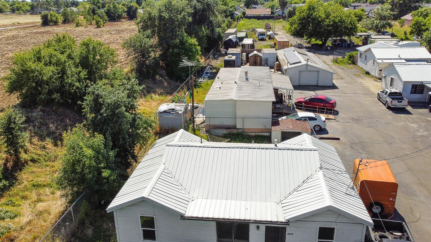 6837 Rio Linda Boulevard Rio Linda, CA 95673 - Photo 45 of 51 an aerial view of a house with a yard and balcony