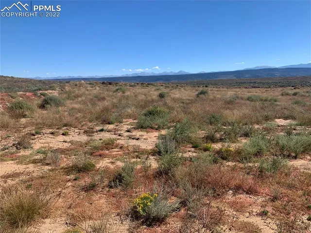 a room with furniture a mirror a piano and a window