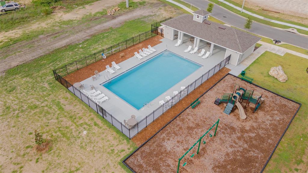 6694 Southwest 11th Lane Gainesville, FL 32607 - Photo 25 of 27 view of a pool with a yard