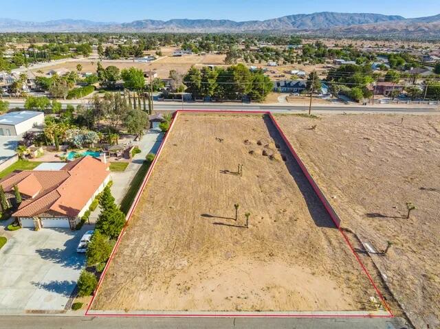 Desert Rose Drive Lancaster, CA 93536 - Photo 7 of 8 an aerial view of residential houses with outdoor space