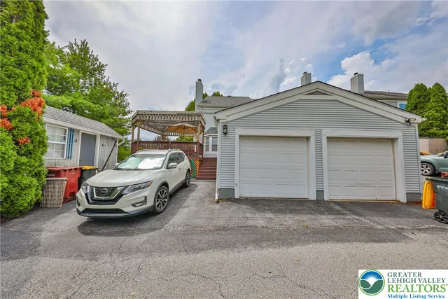 a car parked in front of a house