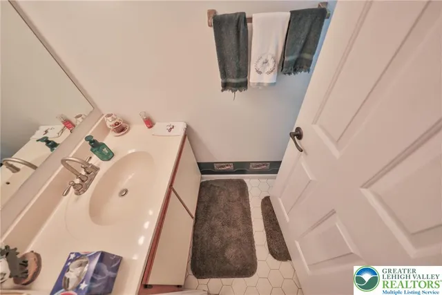 a view of living room with furniture and rug