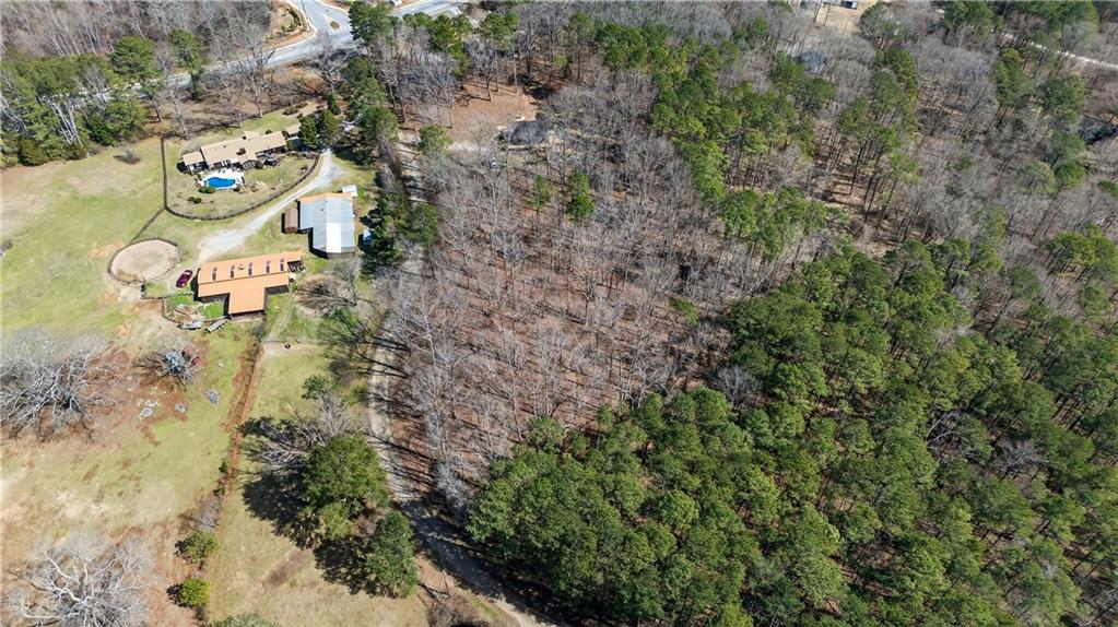 0 Northcutt Road Fairburn, GA 30213 - Photo 3 of 14 a aerial view of a house with lots of trees