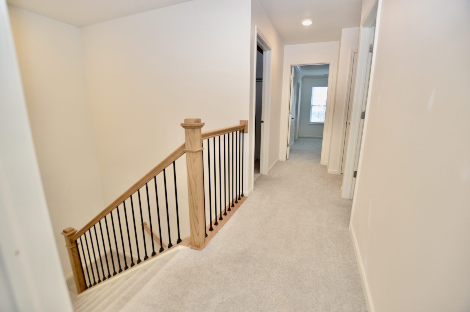 1029 Draper Road McHenry, IL 60050 - Photo 14 of 30 a view of a hallway with wooden floor and entryway