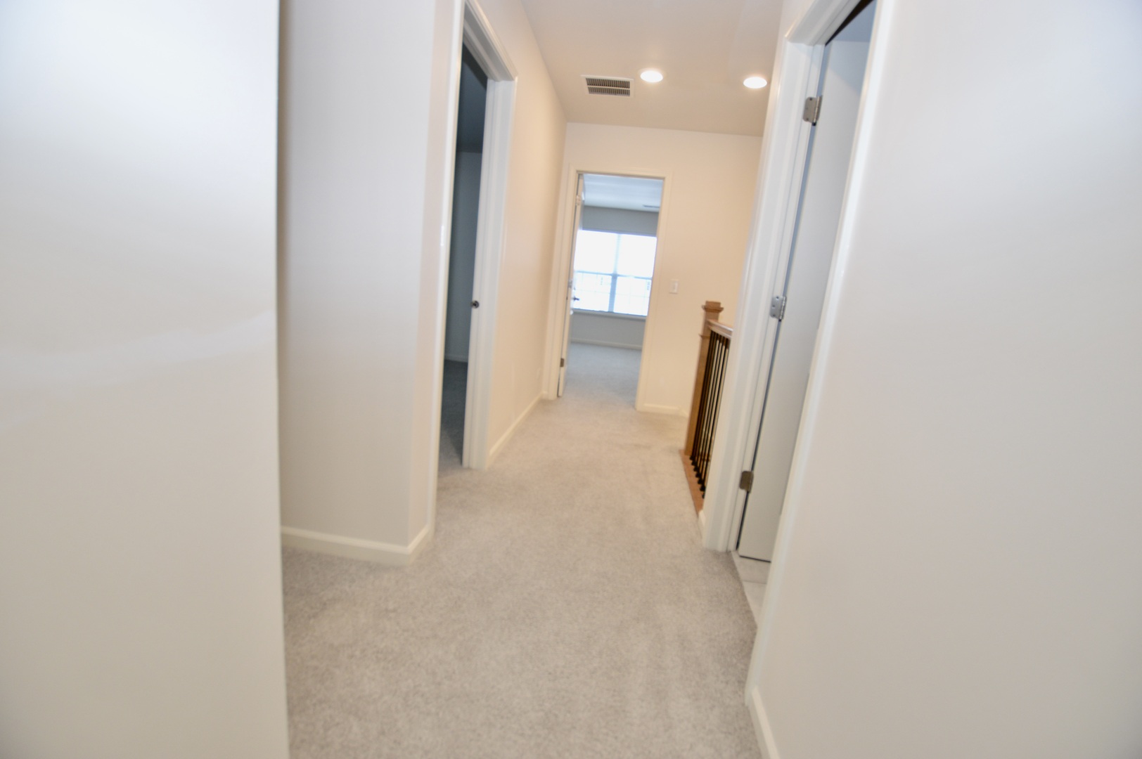 1029 Draper Road McHenry, IL 60050 - Photo 16 of 30 a view of a hallway with a bathroom