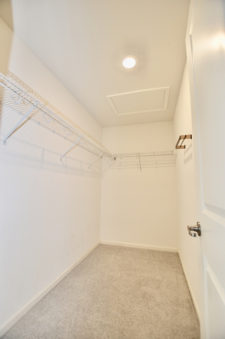 1029 Draper Road McHenry, IL 60050 - Photo 17 of 30 a view of a room with racks on the wall