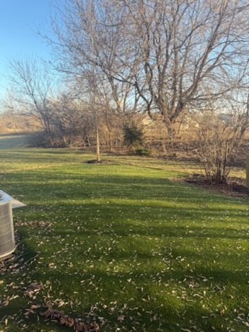 1029 Draper Road McHenry, IL 60050 - Photo 27 of 30 a big yard with lots of green space and trees