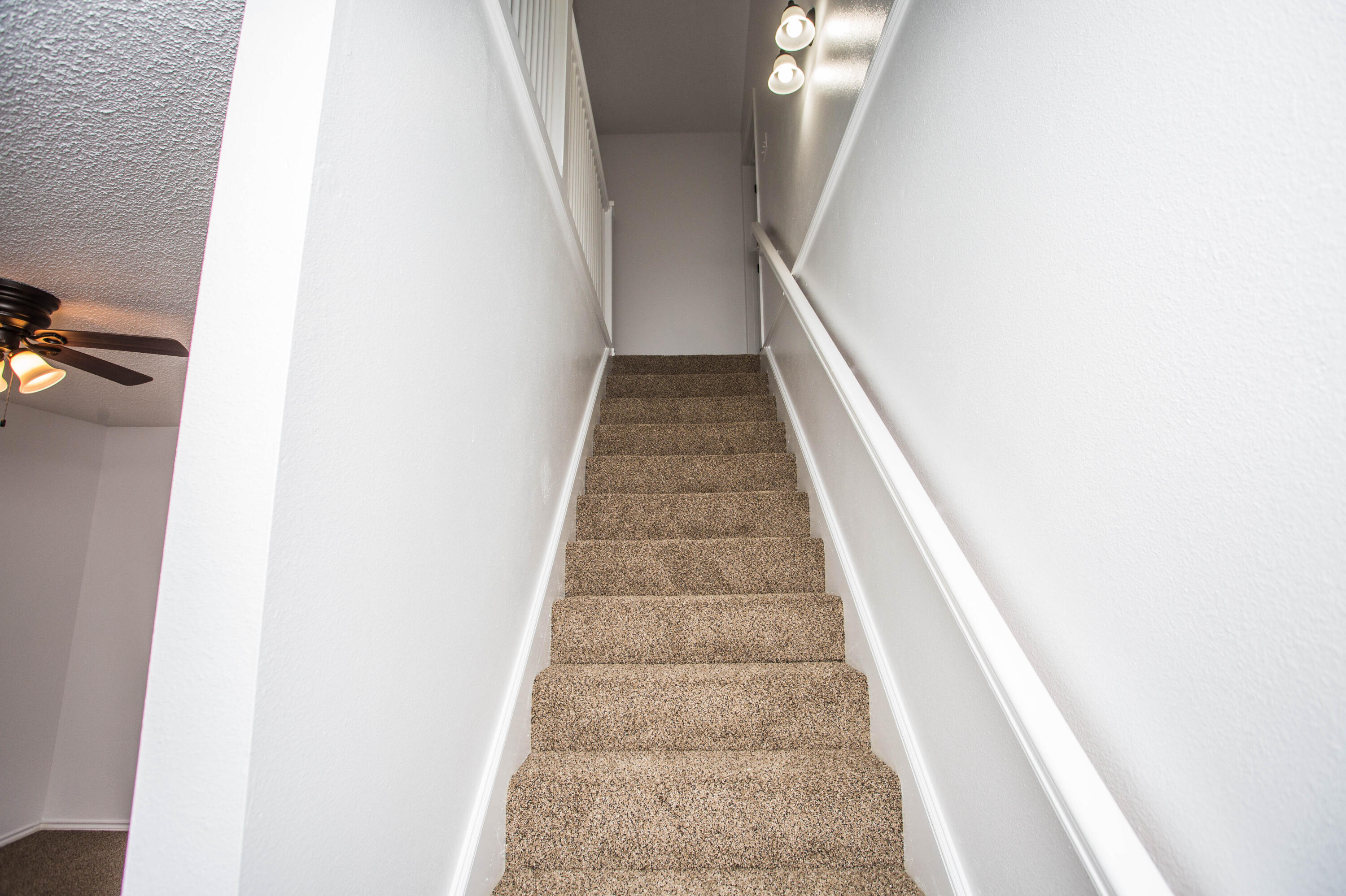 1822 79th Street Lubbock, TX 79423 - Photo 12 of 35 a view of staircase with white walls