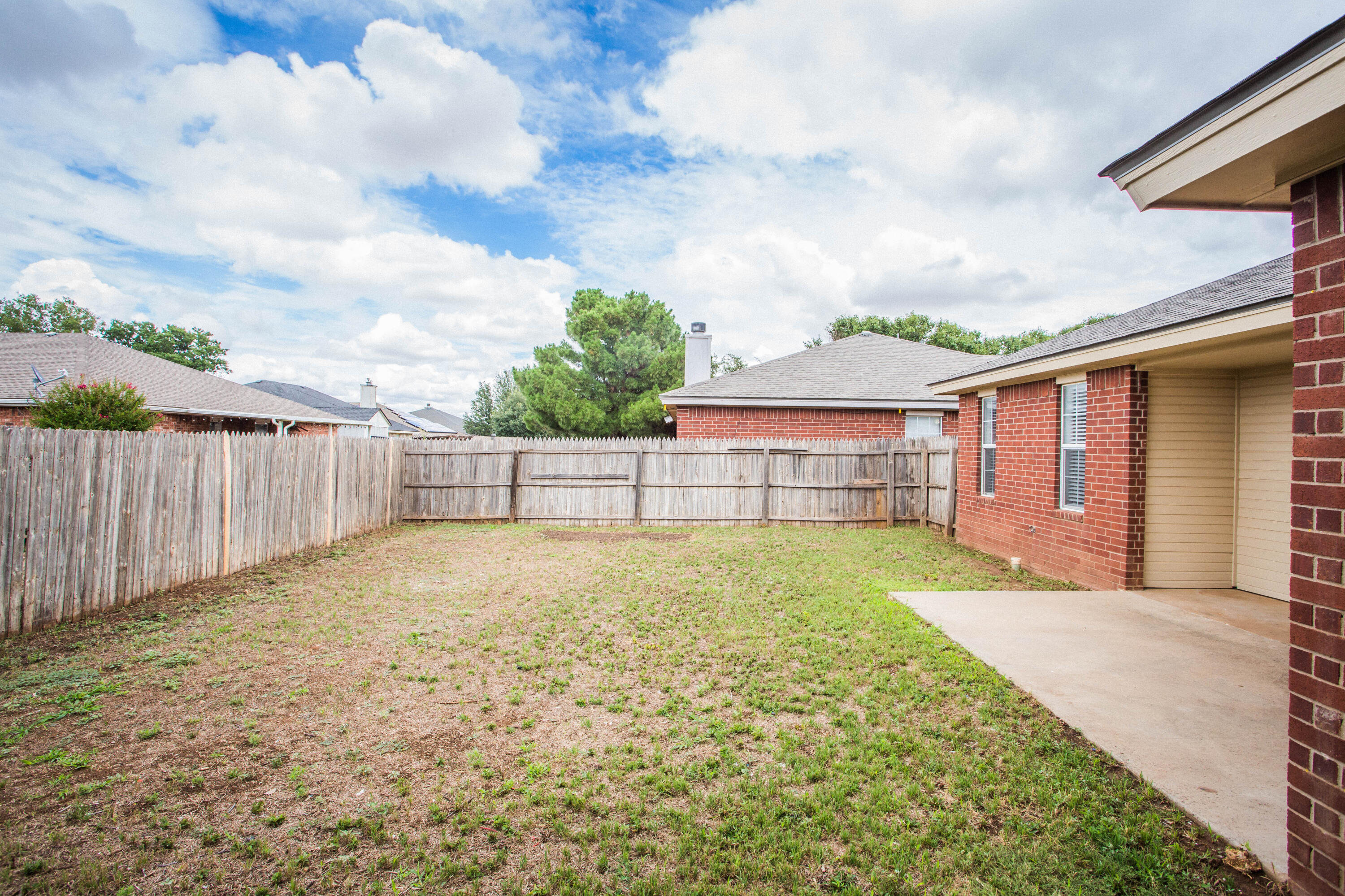 1822 79th Street Lubbock, TX 79423 - Photo 33 of 35 a backyard of a house