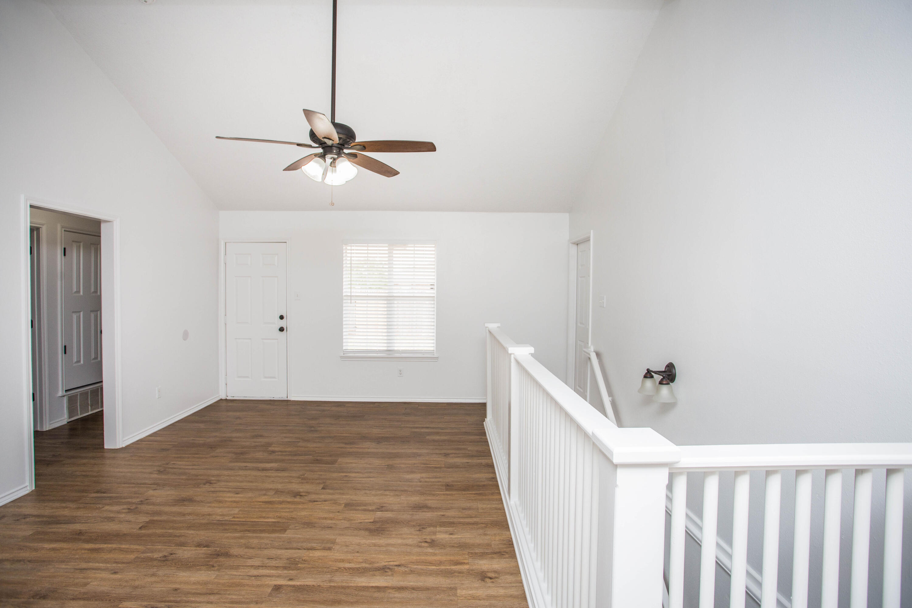 1822 79th Street Lubbock, TX 79423 - Photo 6 of 35 a view of a chandelier fan and entryway