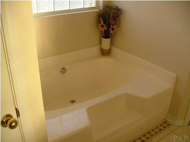4851 Ribault Lane Milton, FL 32570 - Photo 14 of 20 Master Garden Tub and Block Window