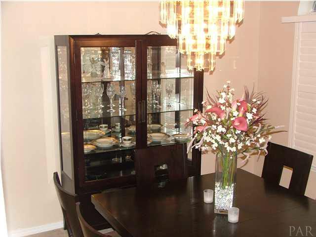 4851 Ribault Lane Milton, FL 32570 - Photo 3 of 20 Dining Room/ Matching Chandelier
