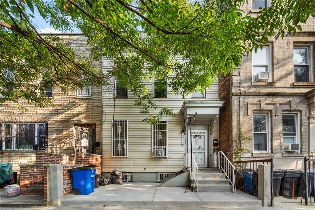 284 MacDougal Street Brooklyn, NY 11233 - Photo 13 of 23 a front view of a building with street view